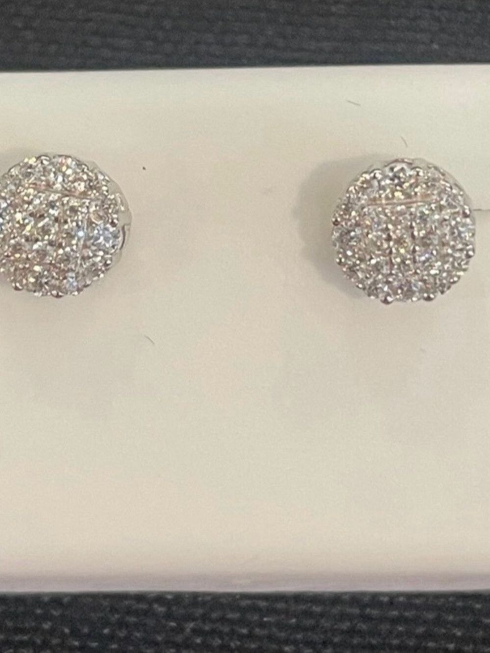 Round 0.50ctw  rhodium plated over 925 sterling Moissanite earrings. Screw backs